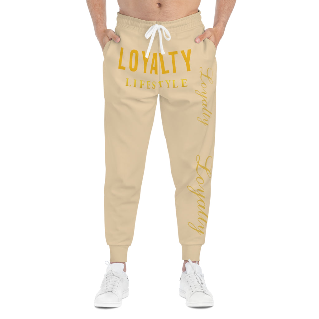 Loyalty Lifestyle Joggers — Cream Athletic Sweatpants with Gold "Loyalty" Script